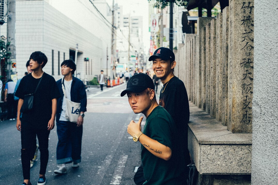 group of friends chatting on street