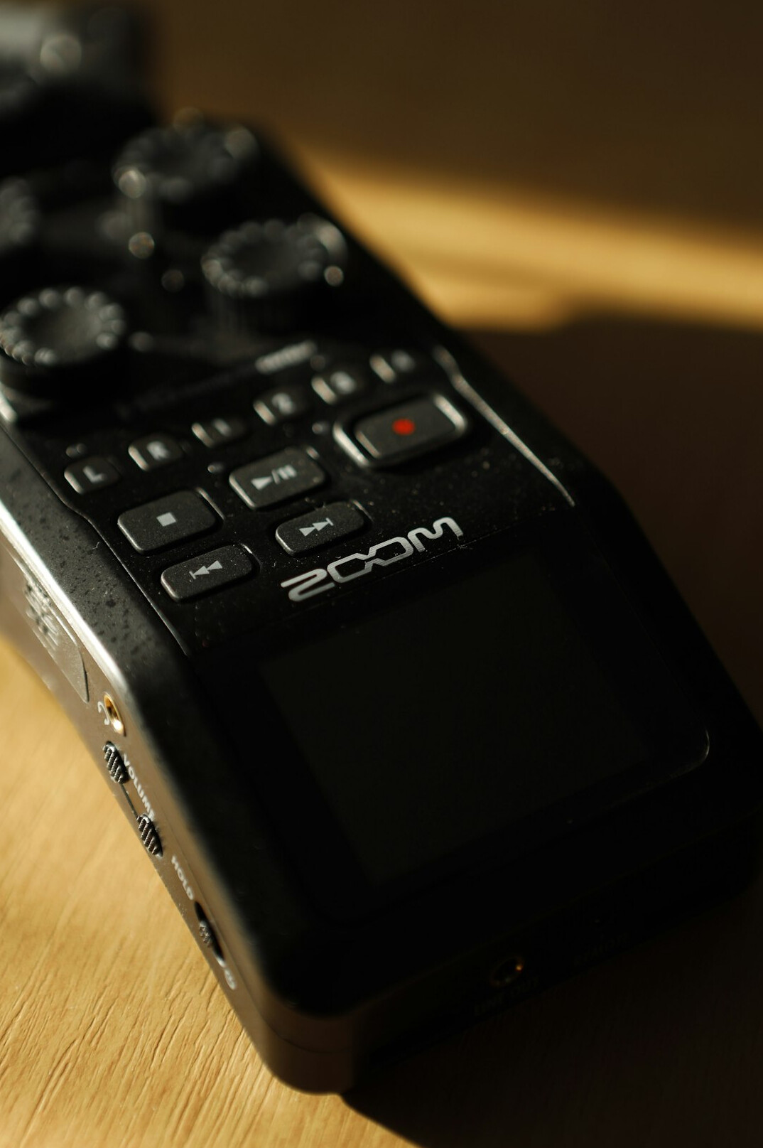 Audio recorder and microphone on a table during an interview