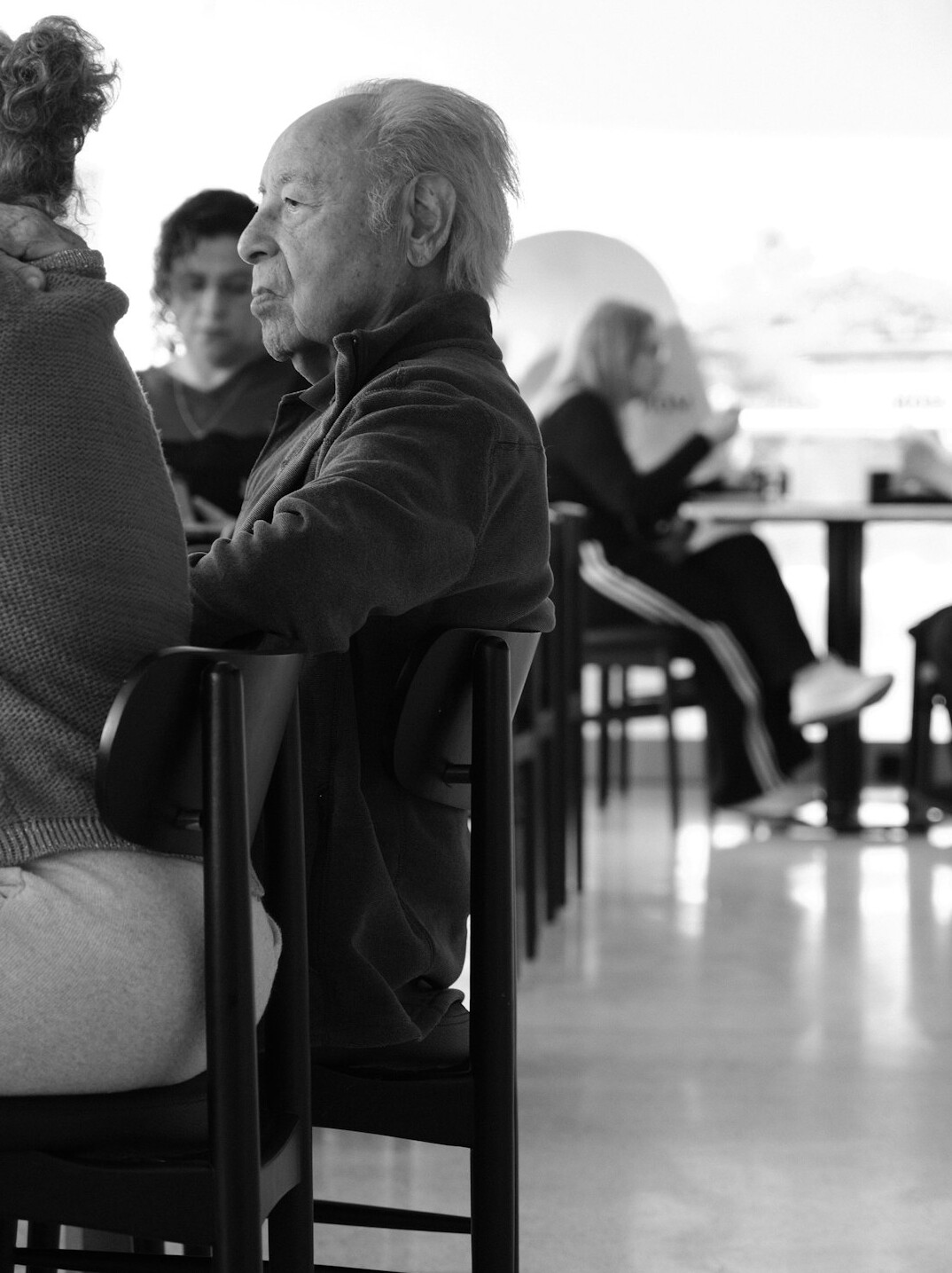 elderly woman in cafe