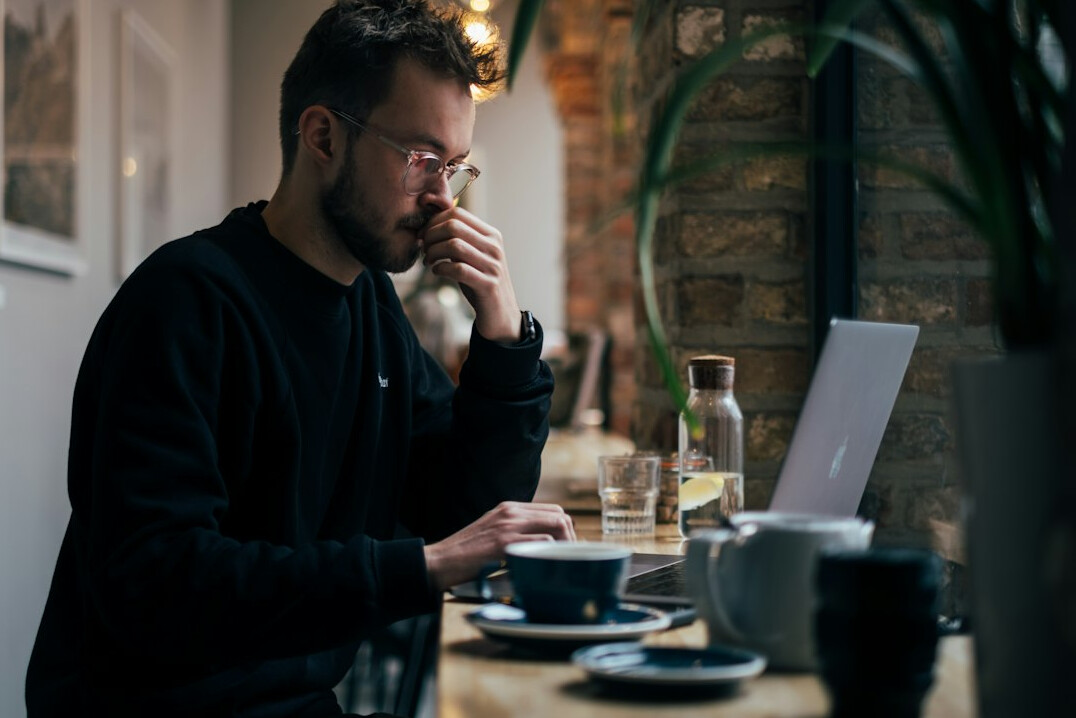 man drinking coffee