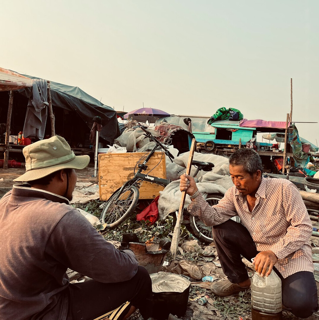 photographer interviewing locals