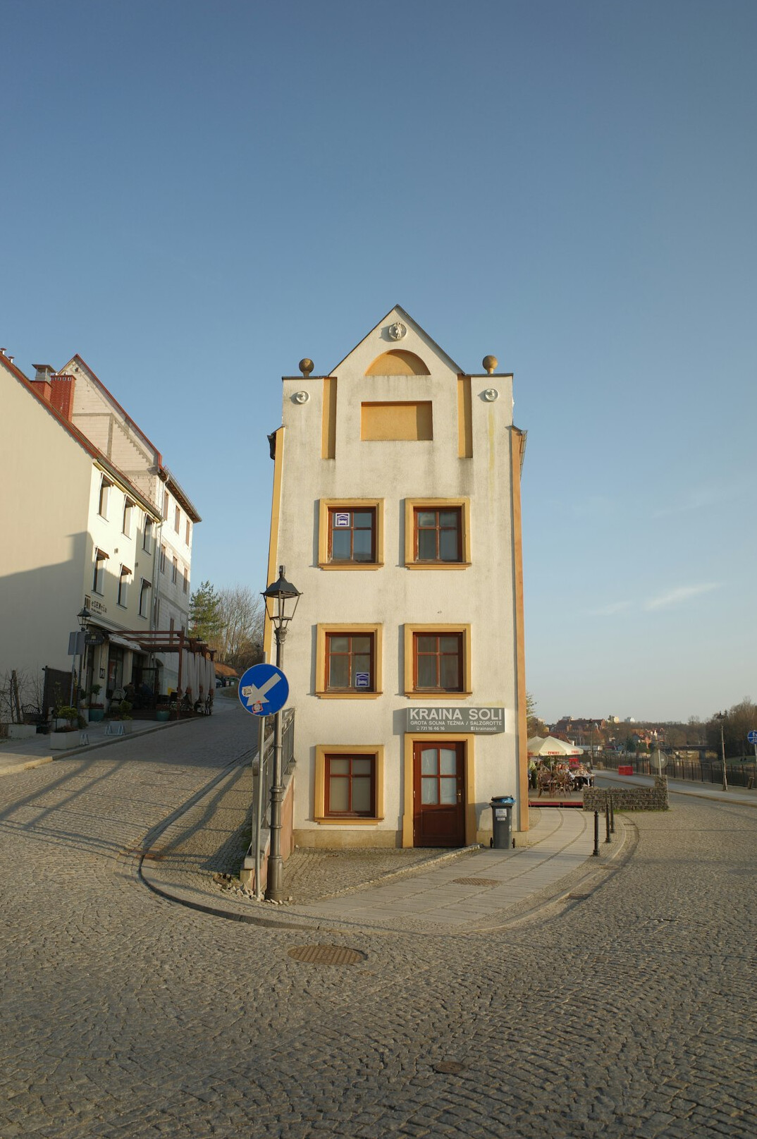 Narrow street in an old Polish town with historic buildings